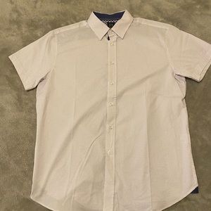 Short sleeve button up. Pink and blue dots